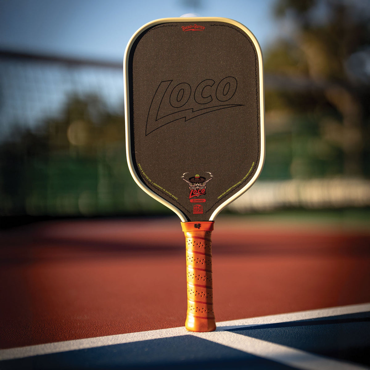 Bread & Butter Loco Elongated Pickleball Paddle - Cream/Tan, on court