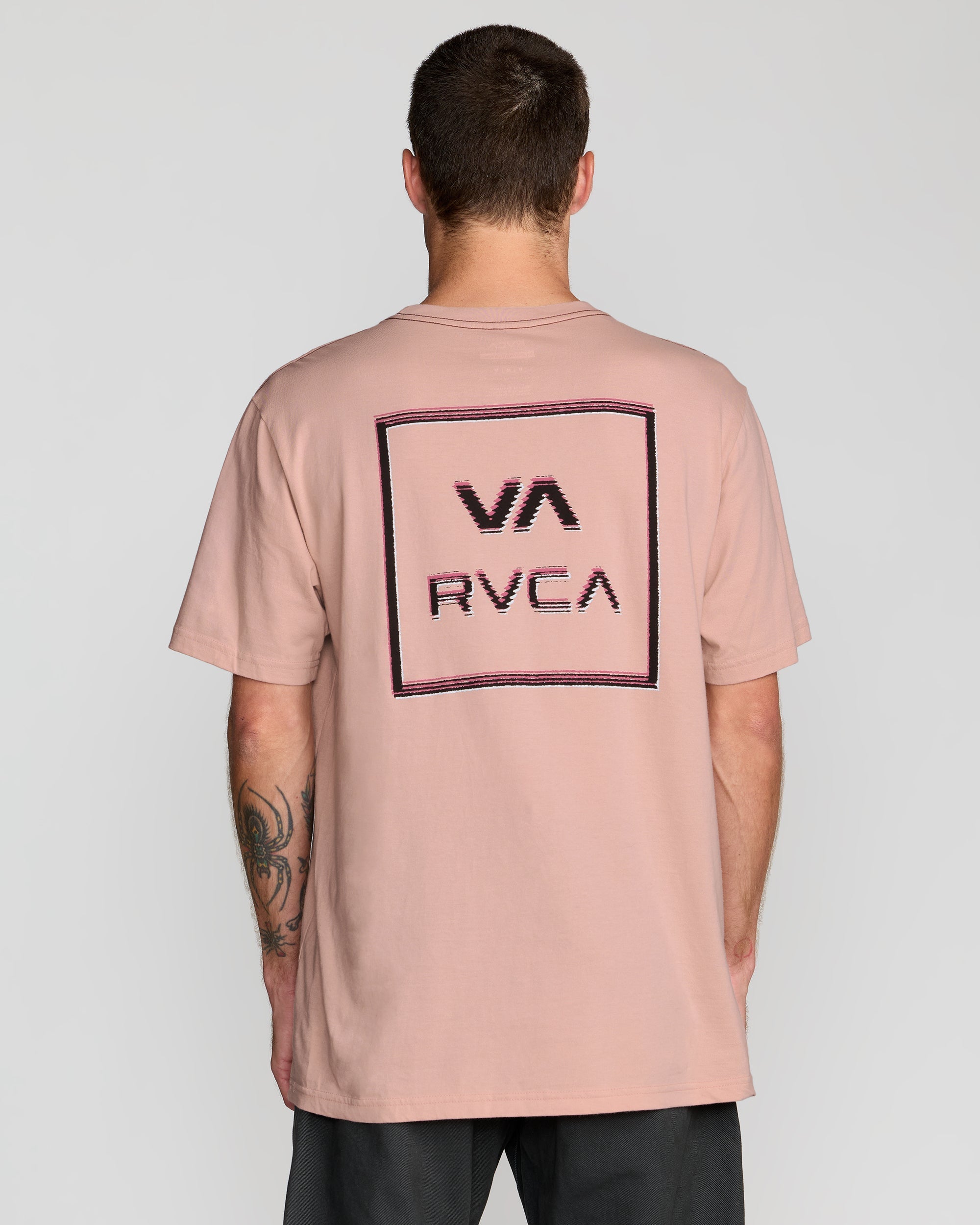 RVCA Glitch Short Sleeve T-Shirt in Pale Mauve - back on model
