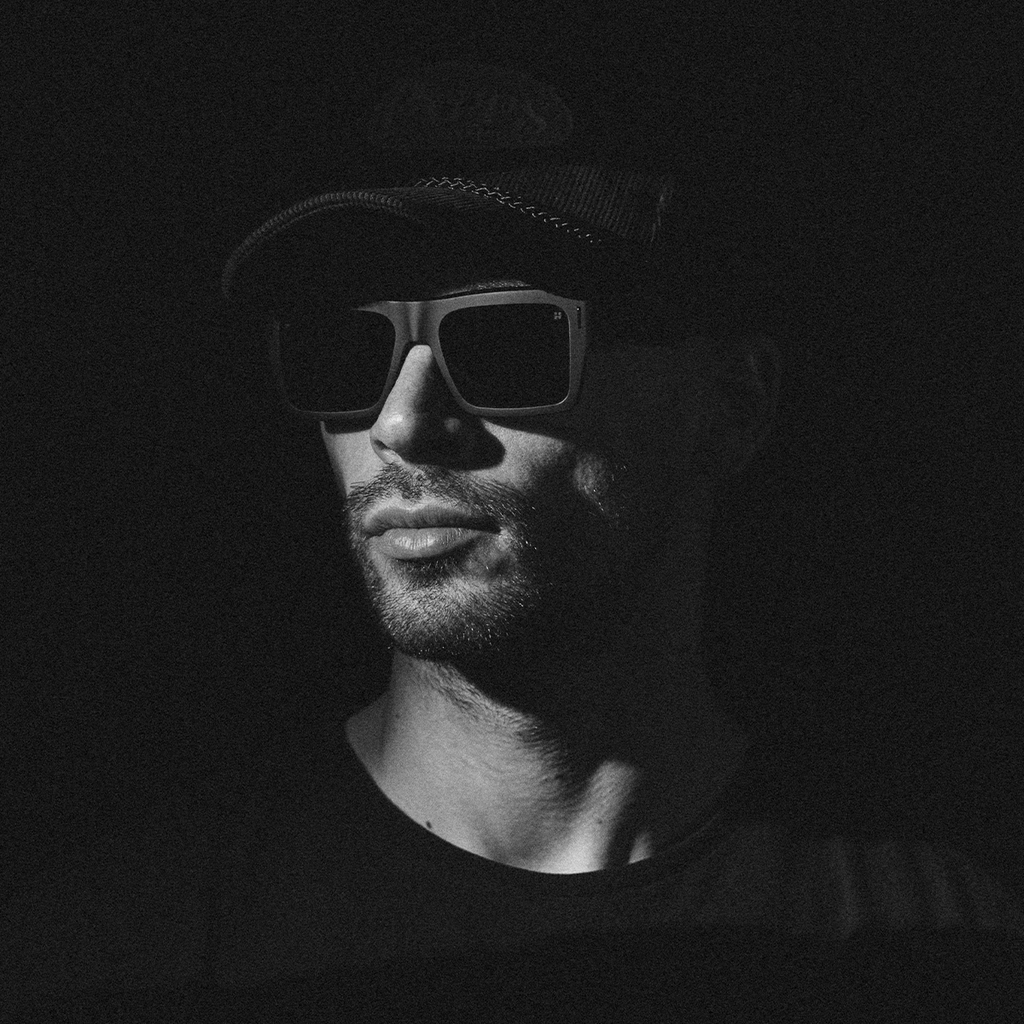 Spy Bowery sunglasses, Black Happy/Black Out colourway, on-model side view