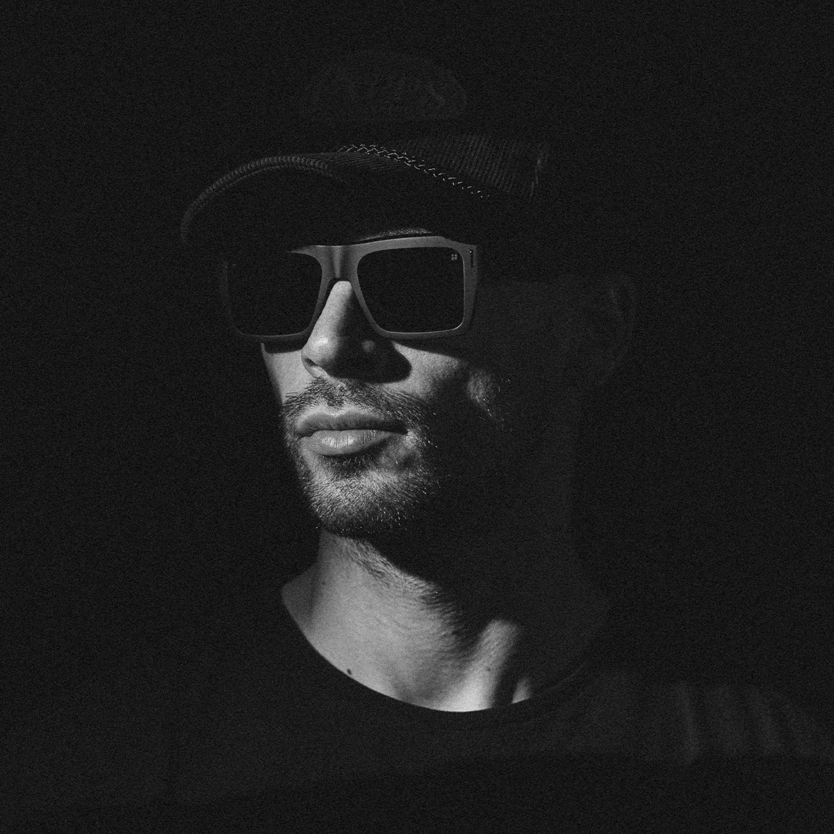Spy Bowery sunglasses, Black Happy/Black Out colourway, on-model side view