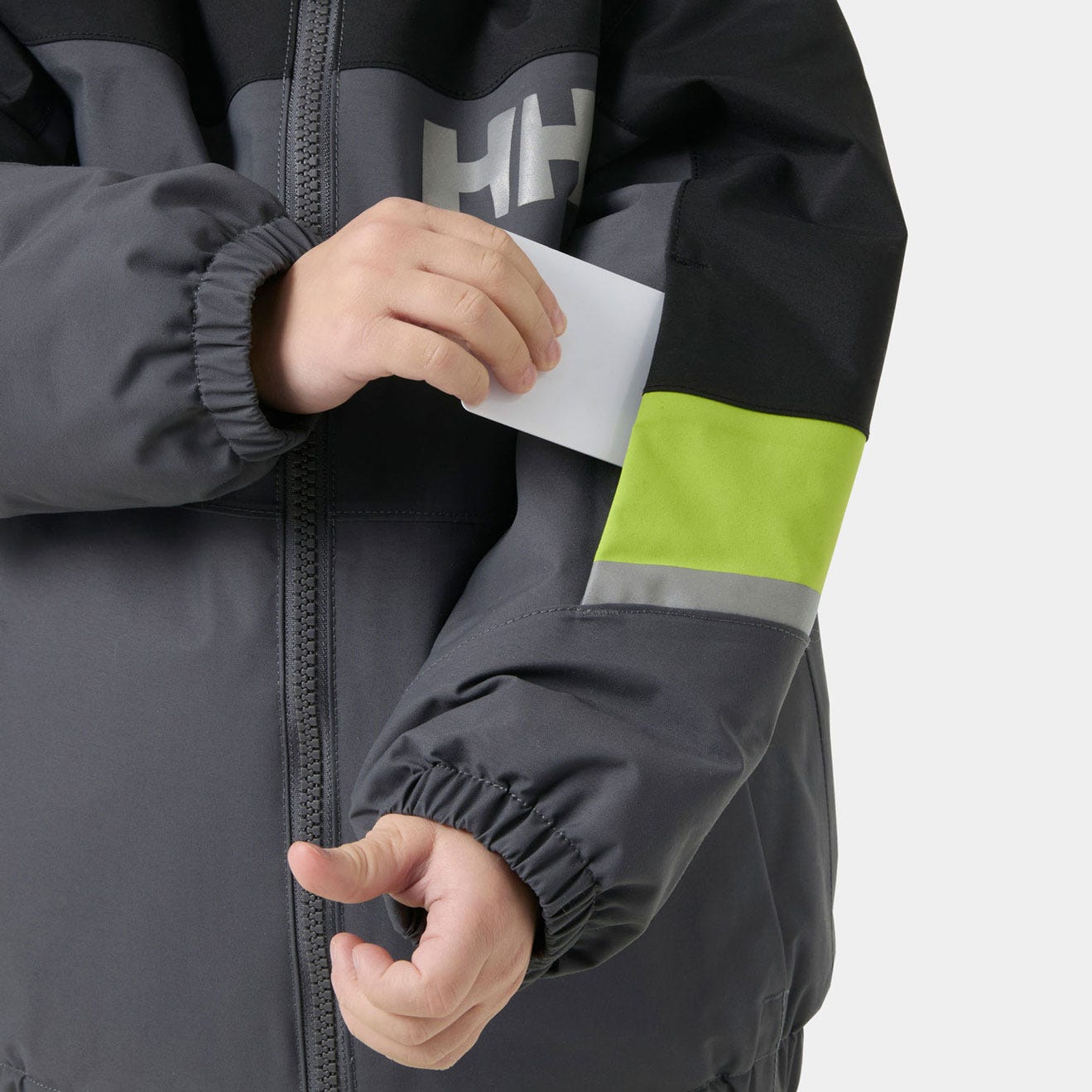 Helly Hansen Kids' Rider Jacket, Thunder Grey, ski pass pocket detail