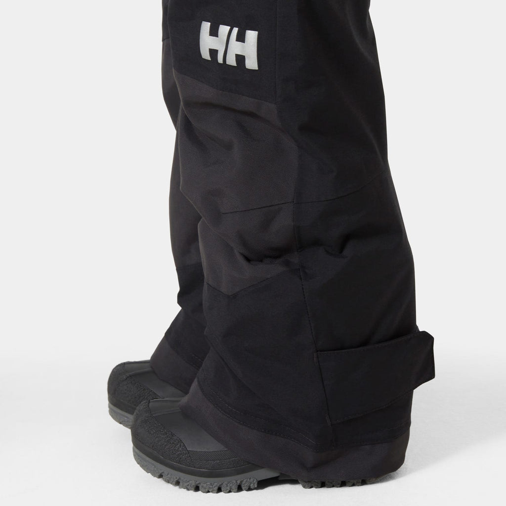 Helly Hansen Kids' Rider 2 Insulated Bib Pants, Black, snow gaiter detail