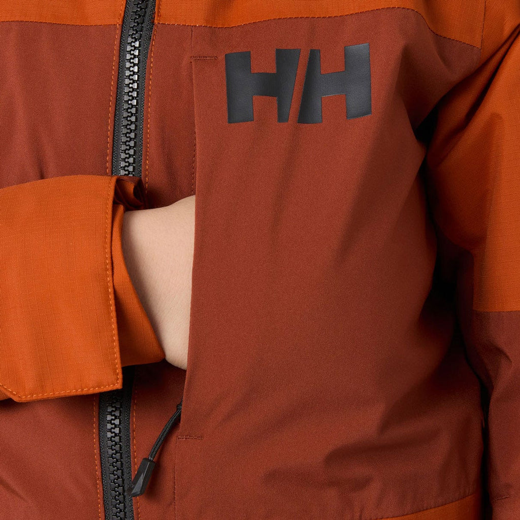 Helly Hansen Juniors' Summit 2.0 Jacket, Iron Oxide, chest pocket detail