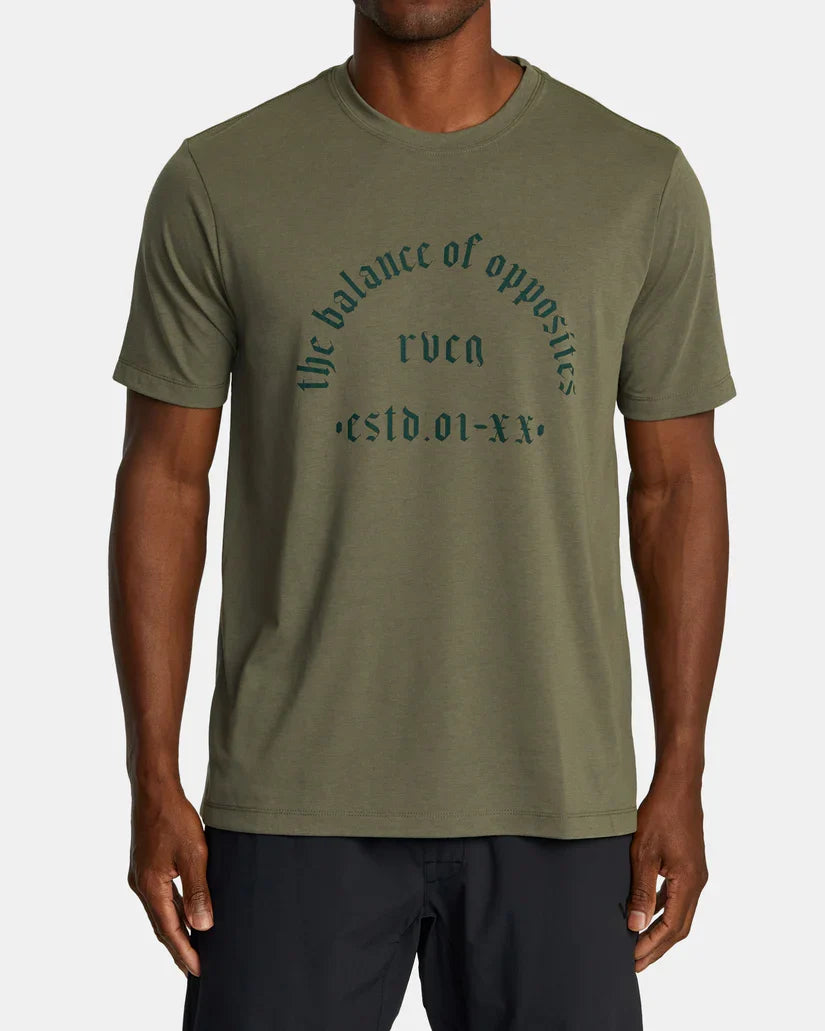 RVCA Old Arch Short Sleeve Tee in Olive - front on model