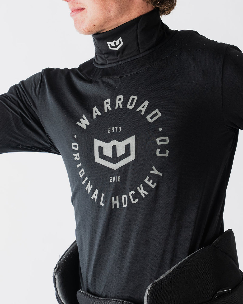 Warroad Core TILO Neck & Wrist Top in black, back view on model