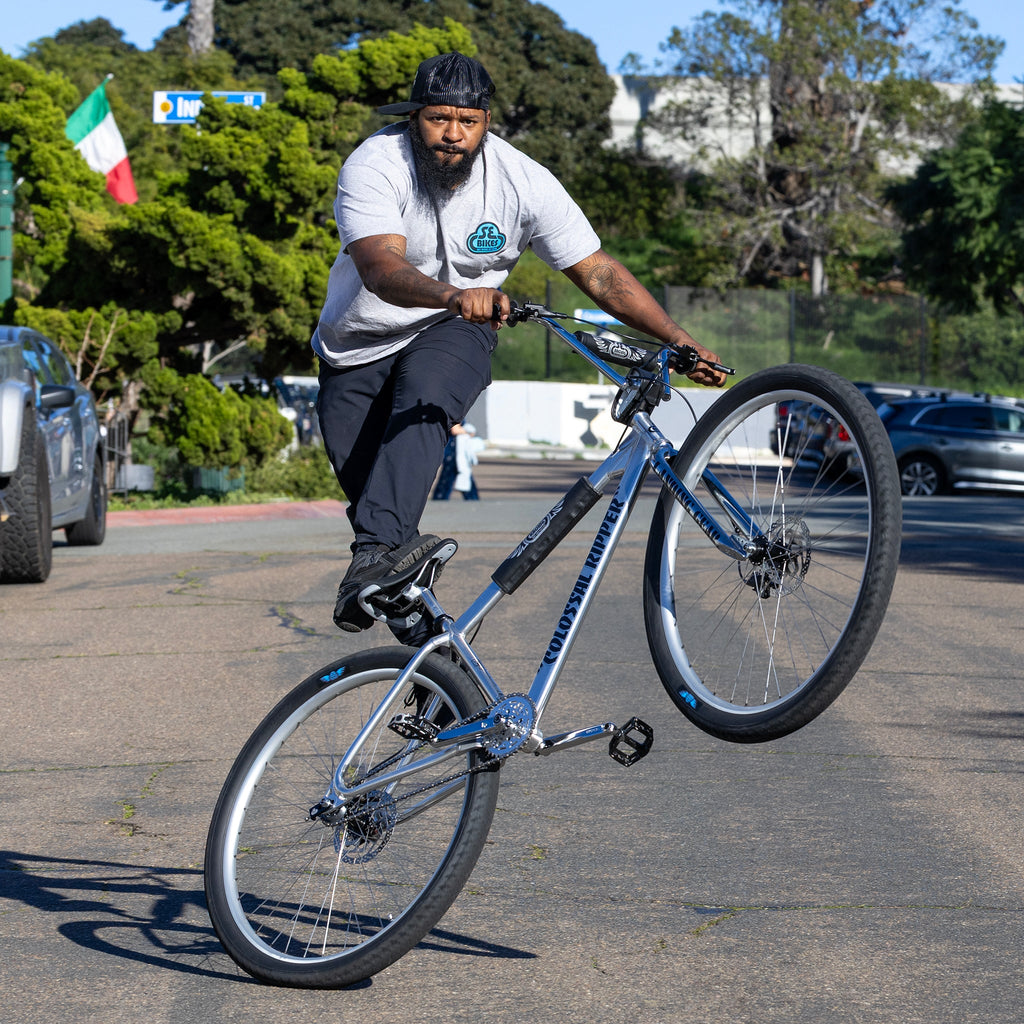 Rider pulling a wheelie on the SE Colossal Ripper 32