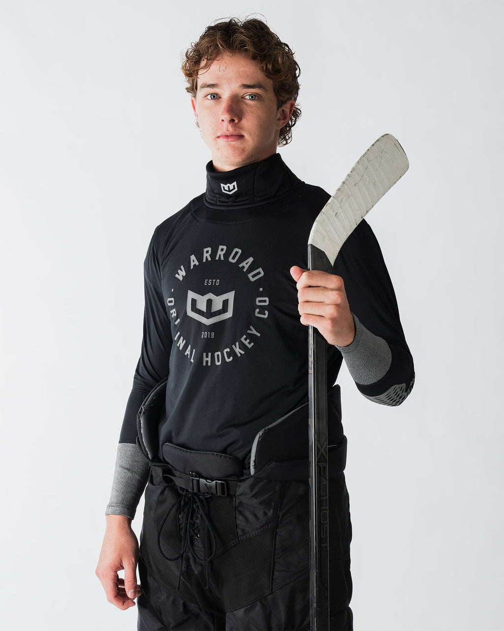 Warroad Core TILO Neck & Wrist Top in black, front view on model