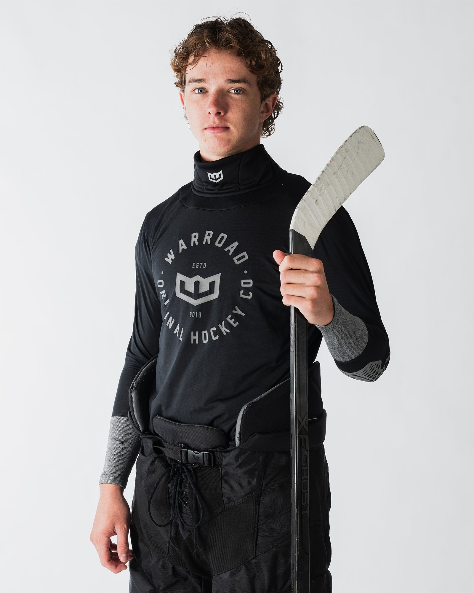 Warroad Core TILO Neck & Wrist Top in black, front view on model