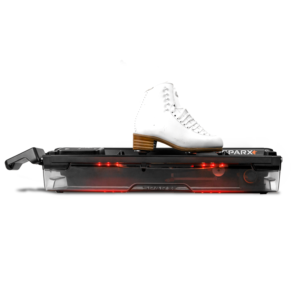 Sparx figure skate adapters fitted to a Sparx sharpener with a figure skate