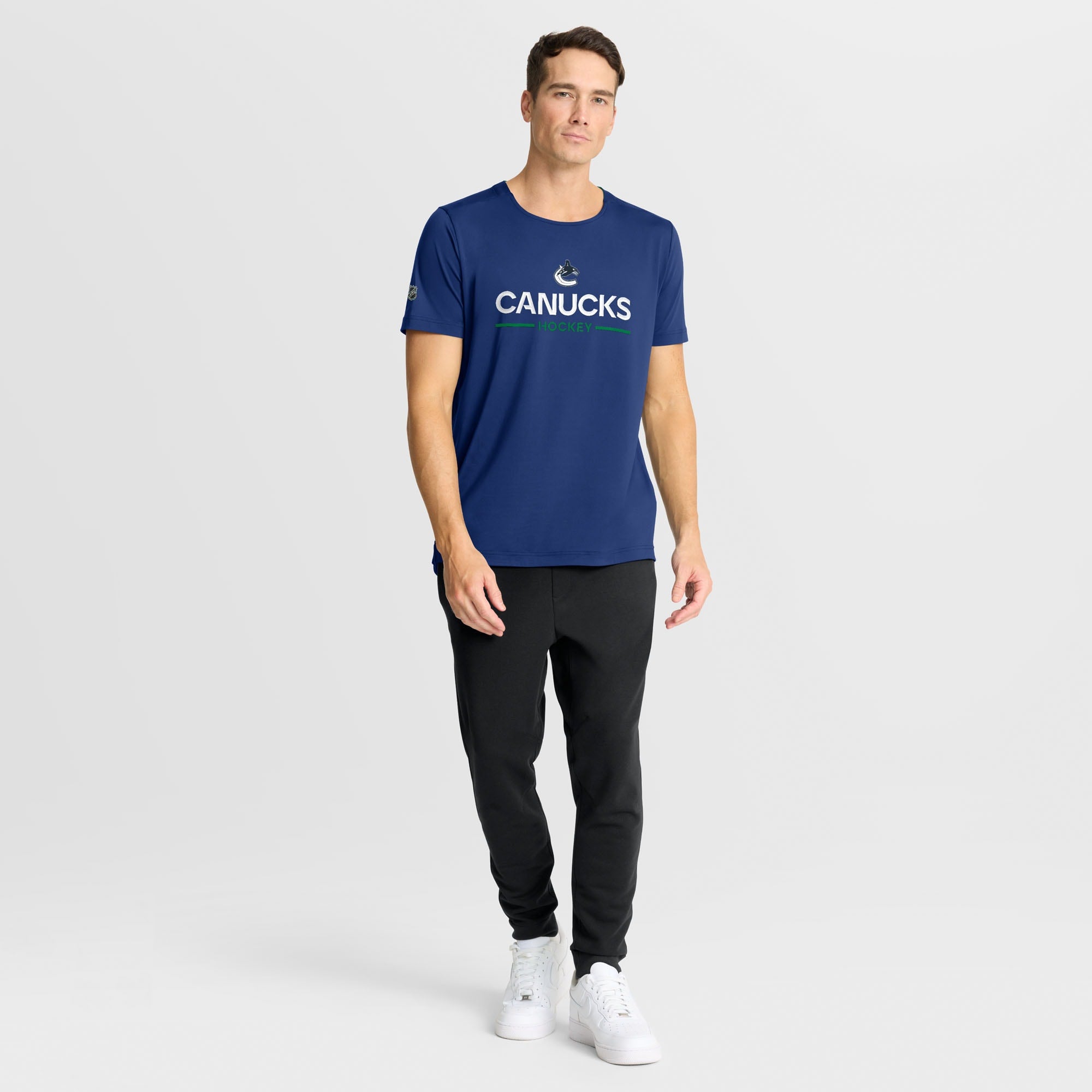 Vancouver Canucks Fanatics Blue Authentic Pro Rink Tech T-Shirt - on-model full length