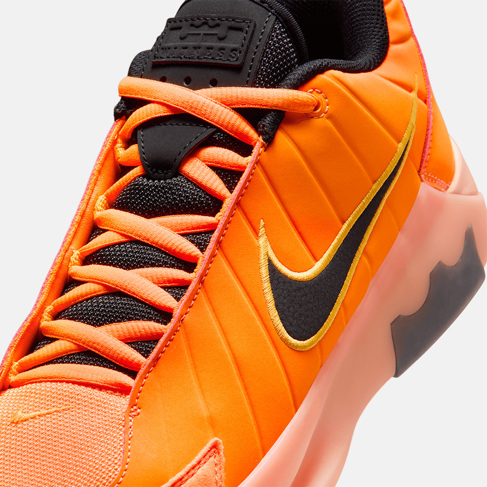 Nike LeBron Witness 9 basketball shoe, Total Orange, swoosh and lacing detail