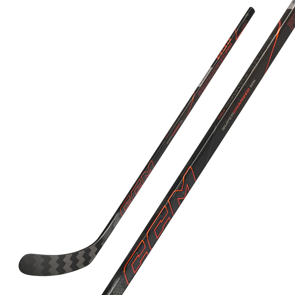 CCM Youth Tacks Recharge Pro Hockey Stick - Black/Orange, front view with shaft detail