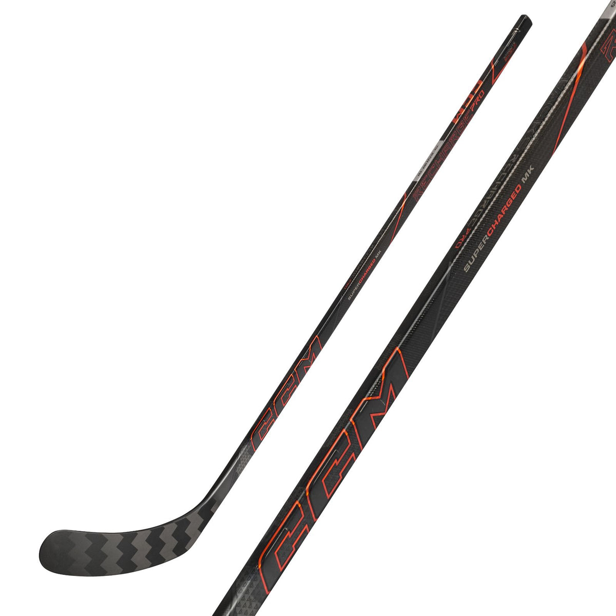 CCM Youth Tacks Recharge Pro Hockey Stick - Black/Orange, front view with shaft detail