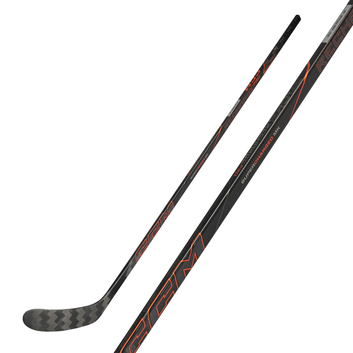 CCM Senior Tacks Recharge Pro Hockey Stick - Black/Orange, front view with shaft detail