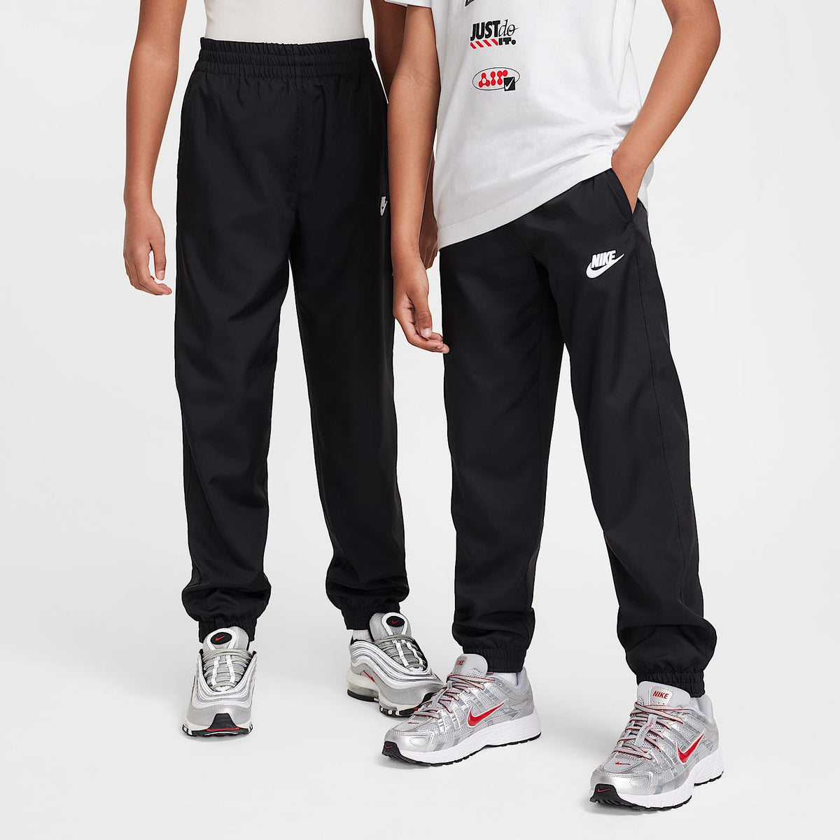 Nike Big Kids' Sportswear Club Woven Jogger Pants - Black/White, front view