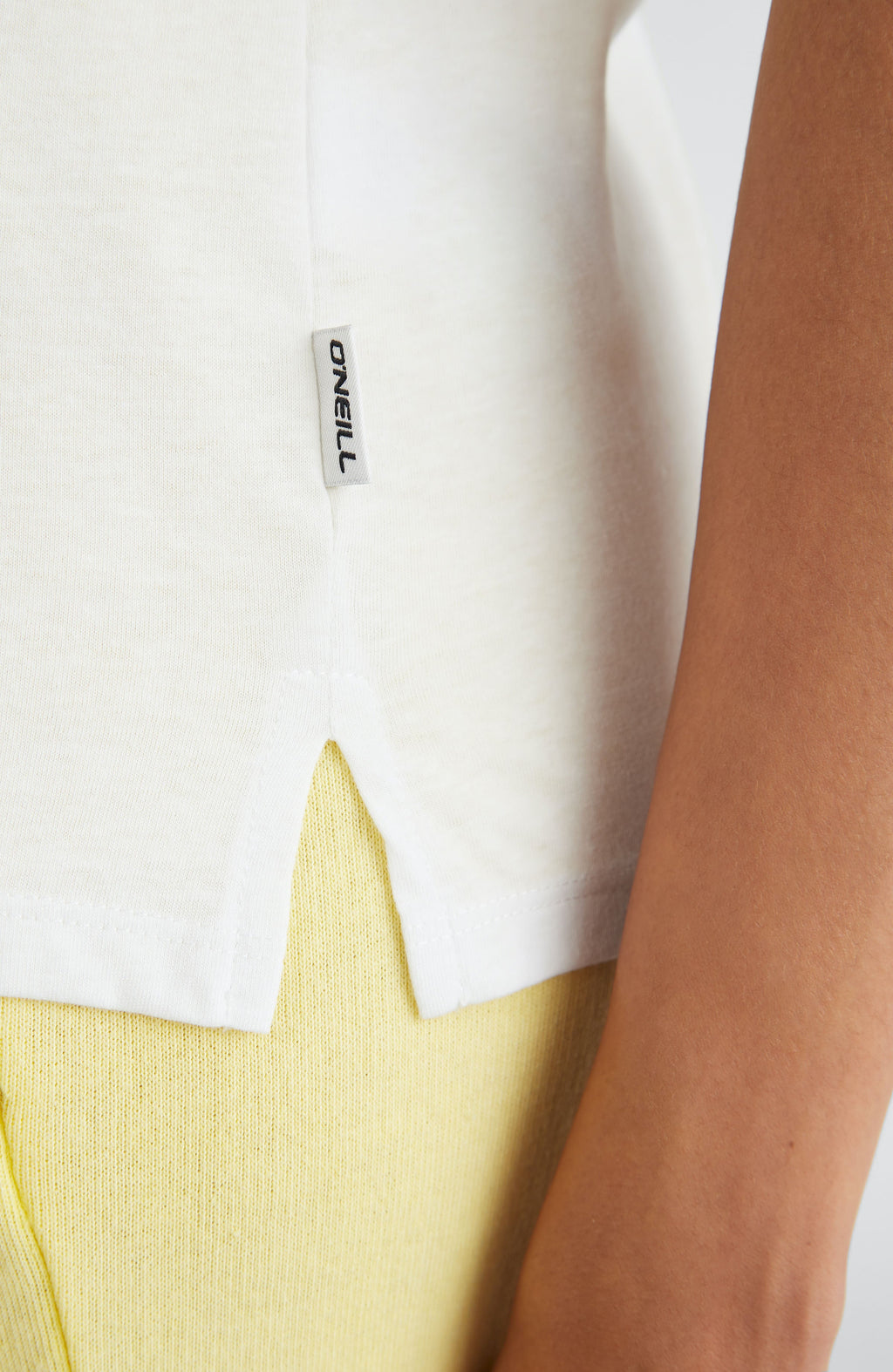 O'Neill Women's Essentials Short Sleeve Tee in White - hem and label detail