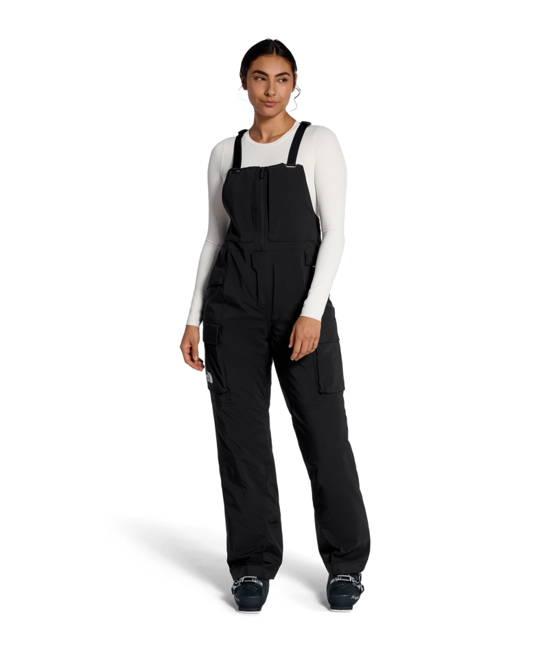 The North Face Women's Freedom Insulated Bib in TNF Black, on model front