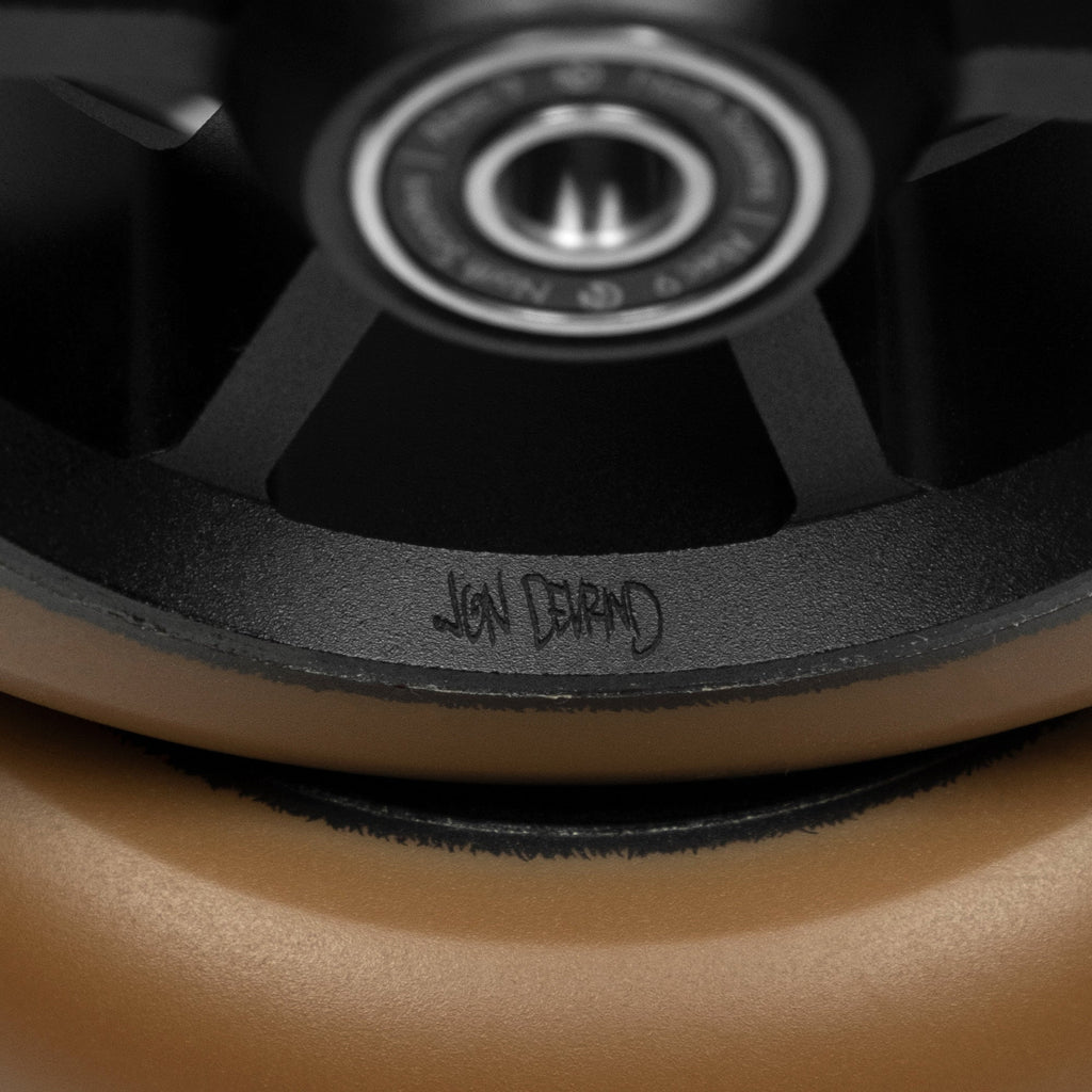 North Scooters Jon deVrind Signature Wheels 115x30mm - Brown/Black, core signature detail
