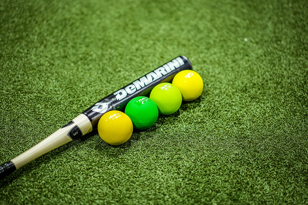 Play9 Hitting Plyo balls with bat