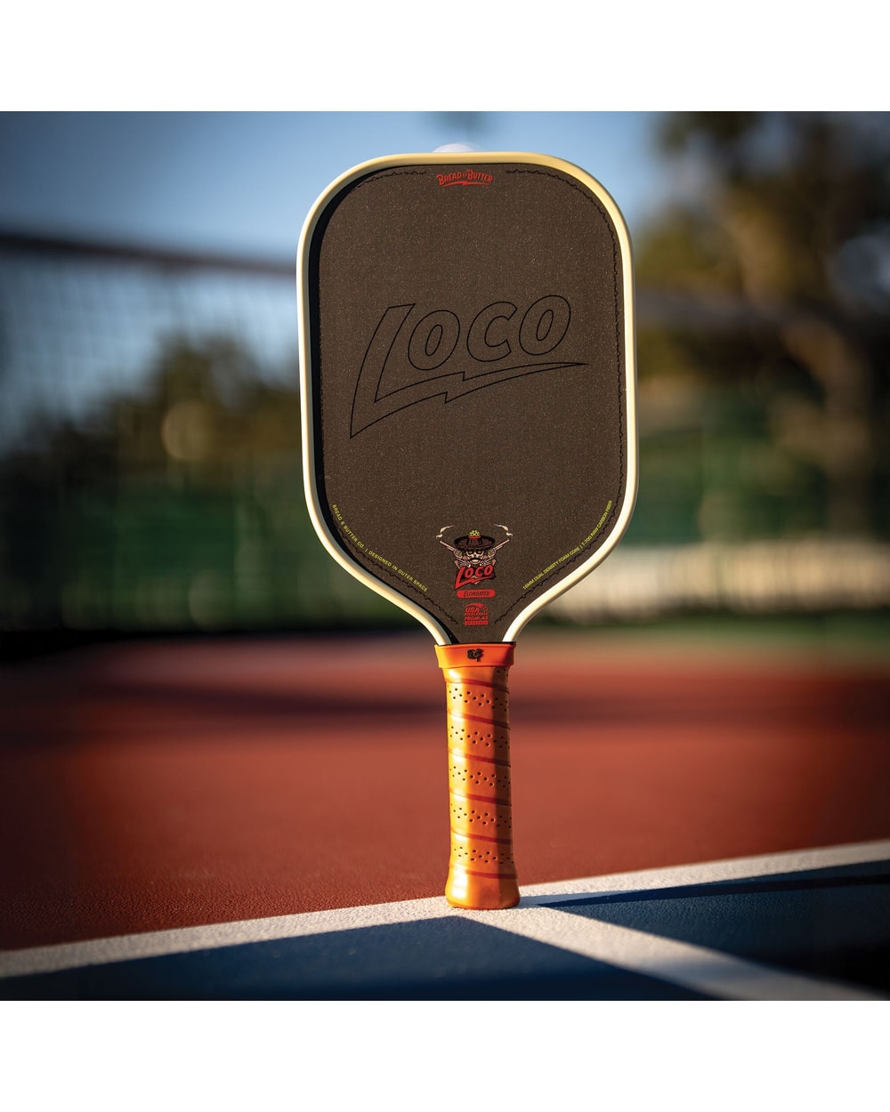 Bread & Butter Loco Elongated Pickleball Paddle - Cream/Tan, on court