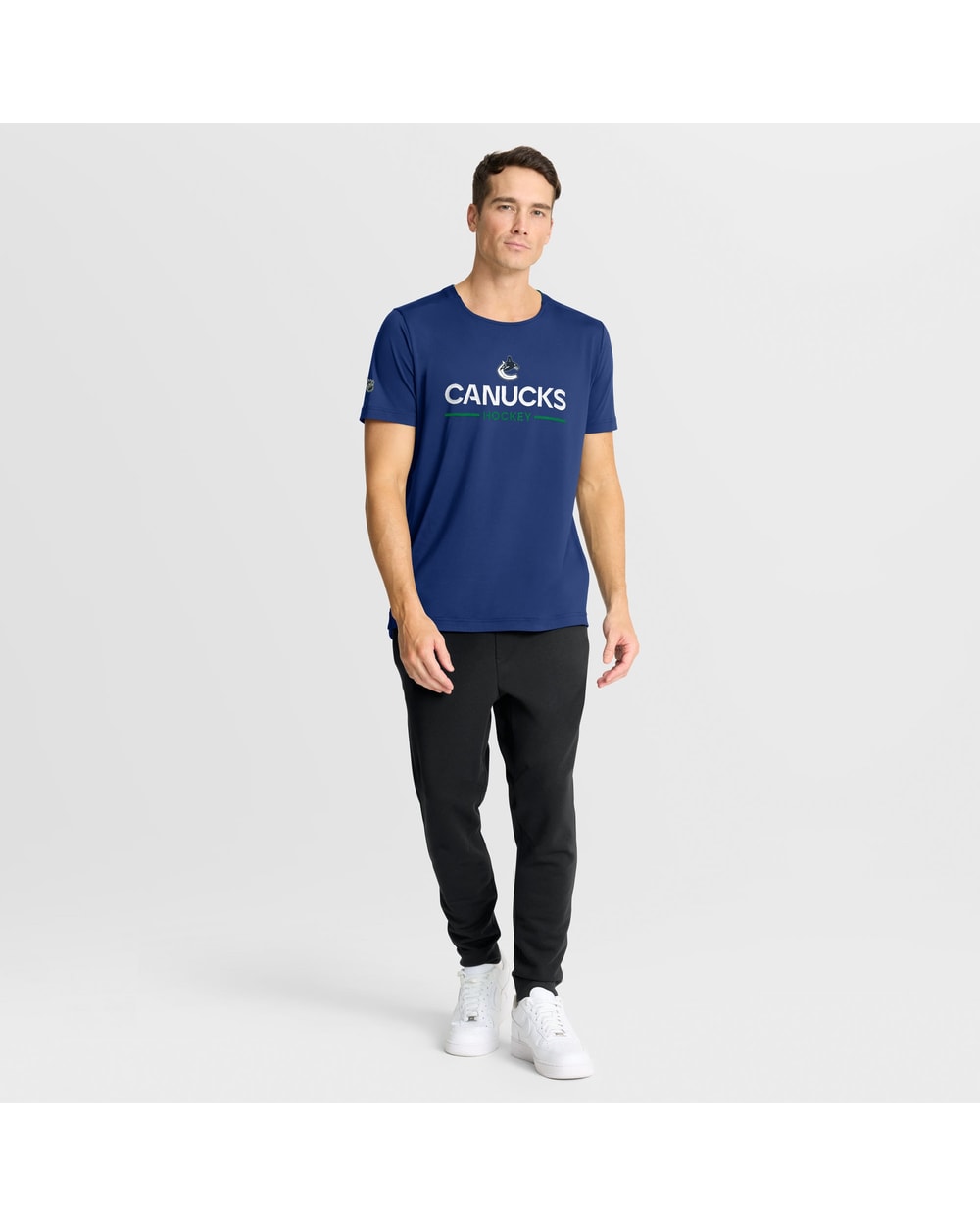 Vancouver Canucks Fanatics Blue Authentic Pro Rink Tech T-Shirt - on-model full length
