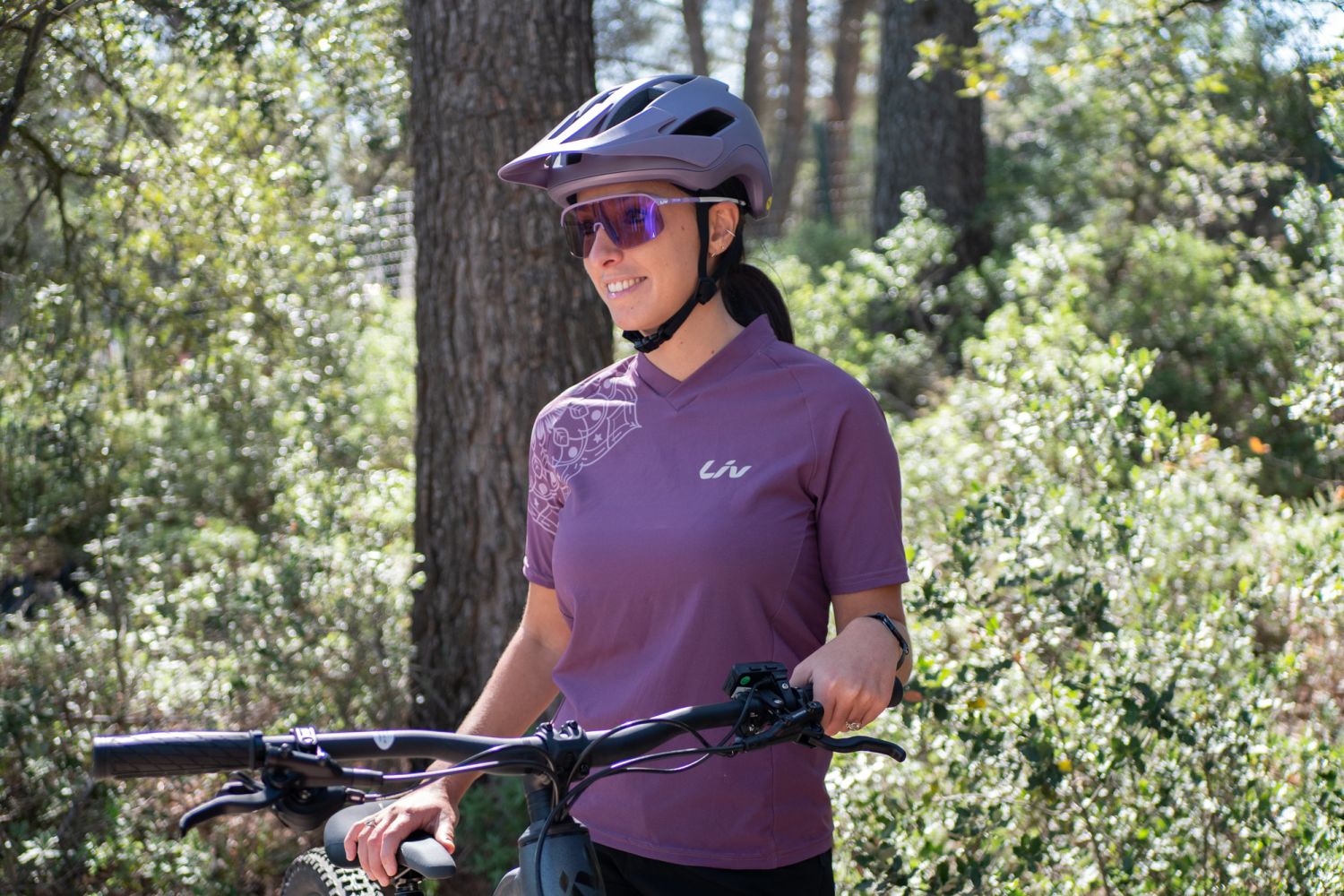 Liv Roost MIPS Bike Helmet - Air Glow - worn on the trail