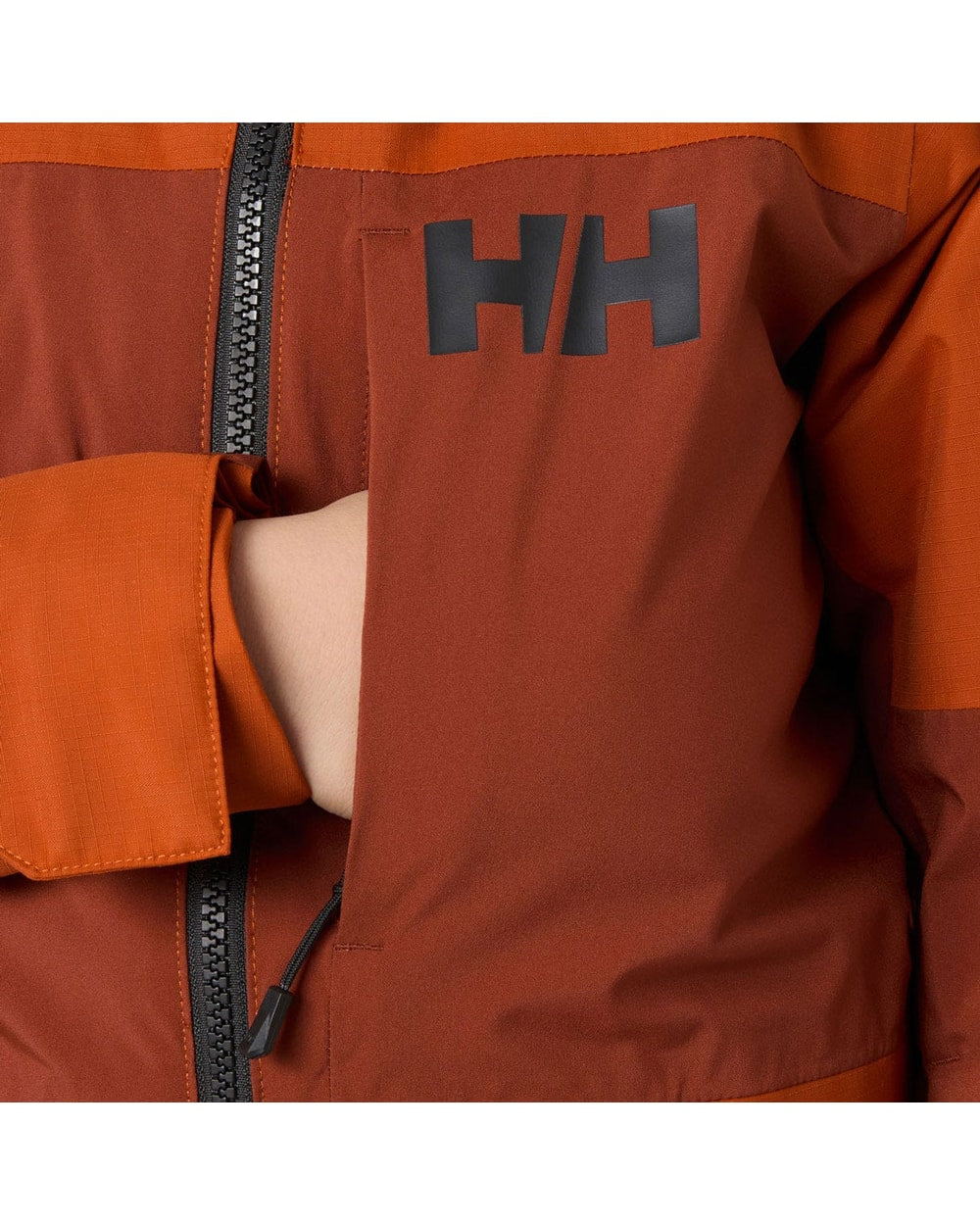 Helly Hansen Juniors' Summit 2.0 Jacket, Iron Oxide, chest pocket detail
