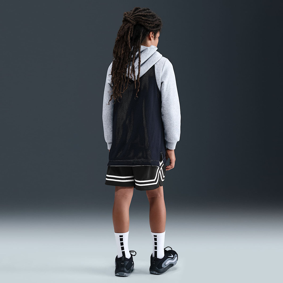 Nike Big Kids' Crossover Dri-FIT 5" Basketball Shorts in Black/Black/White - back