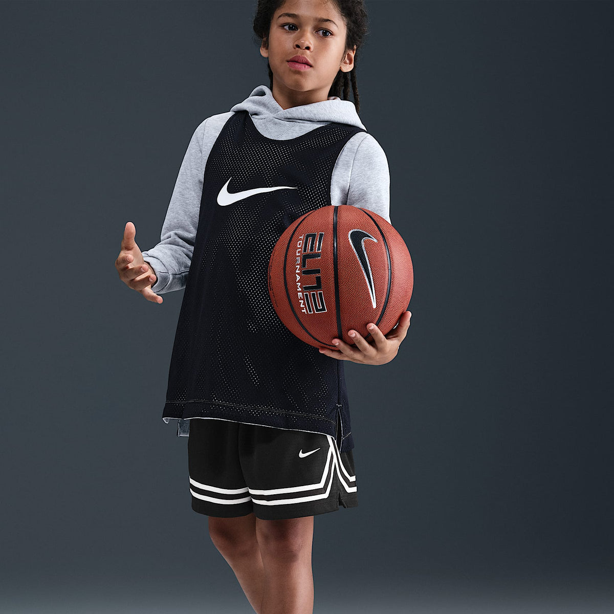 Nike Big Kids' Crossover Dri-FIT 5" Basketball Shorts in Black/Black/White - front