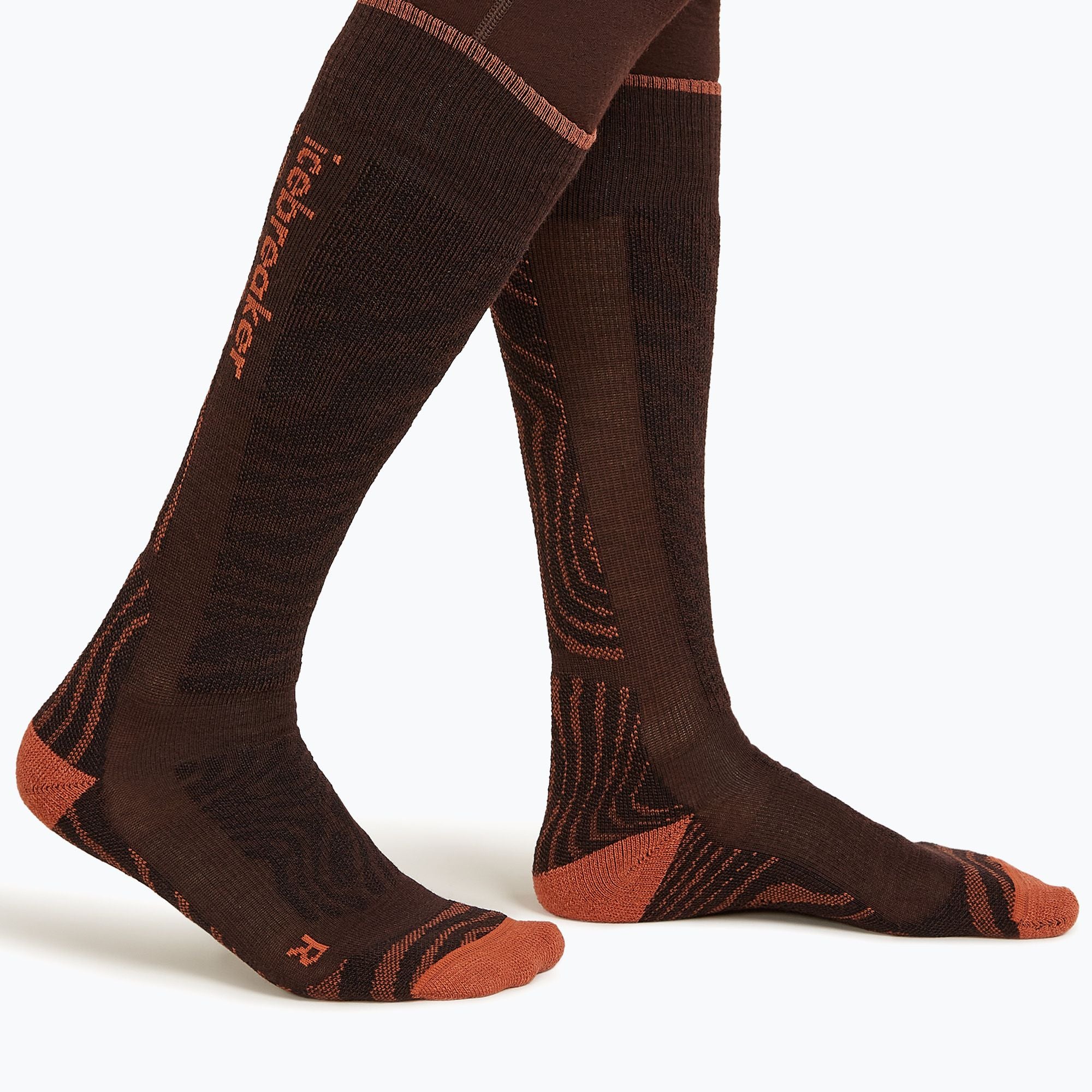 Icebreaker Blend Ski+ Medium OTC Mountain Contour sock, Bittersweet/Cedarwood/Black, on model