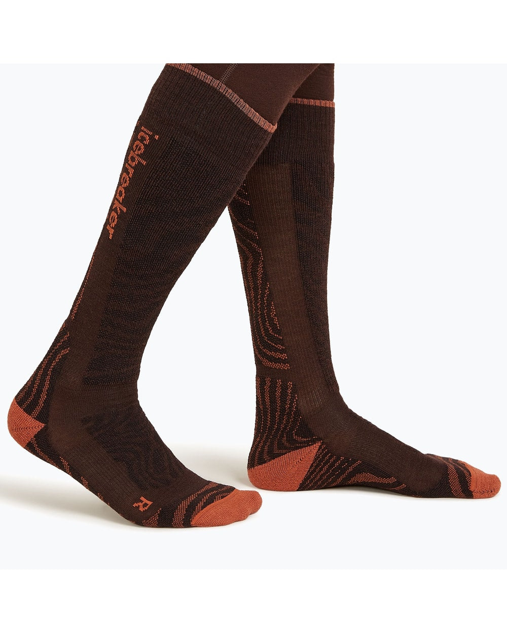 Icebreaker Blend Ski+ Medium OTC Mountain Contour sock, Bittersweet/Cedarwood/Black, on model