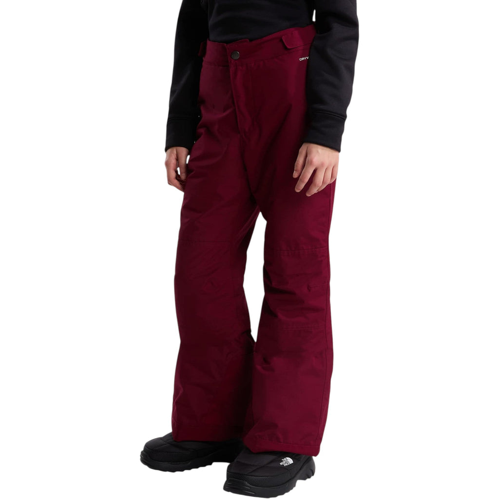 The North Face Girls' Freedom Insulated Pant in Burgundy Crush, front on model