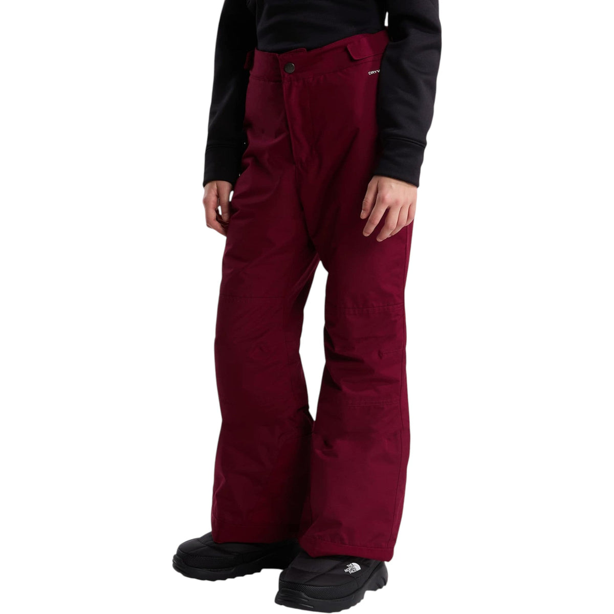The North Face Girls' Freedom Insulated Pant in Burgundy Crush, front on model