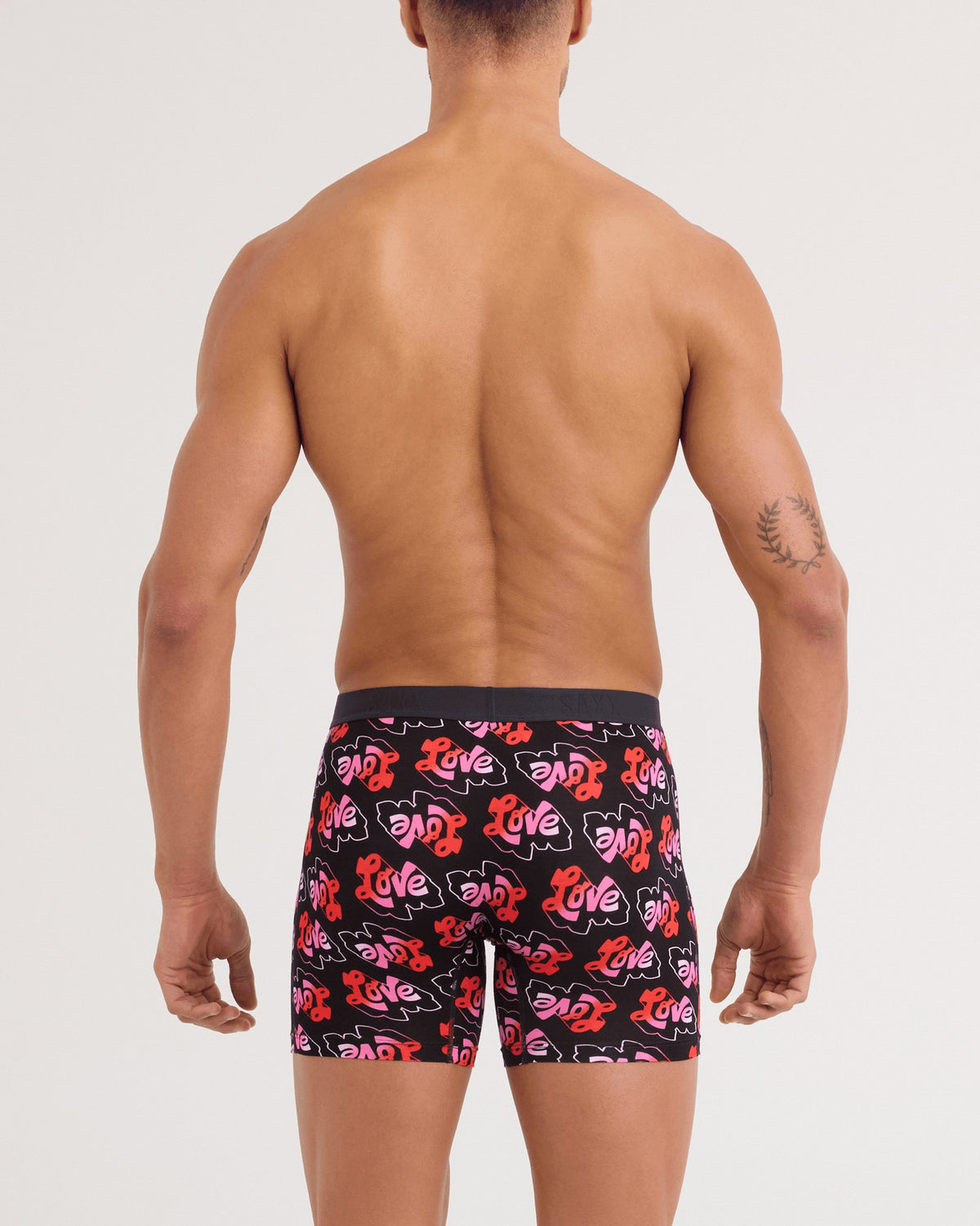 Saxx Vibe Xtra Soft Comfort Boxer Brief - Love Mark Black, on model, back