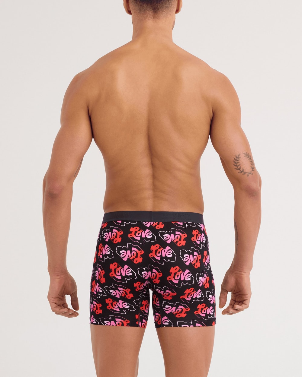 Saxx Vibe Xtra Soft Comfort Boxer Brief - Love Mark Black, on model, back