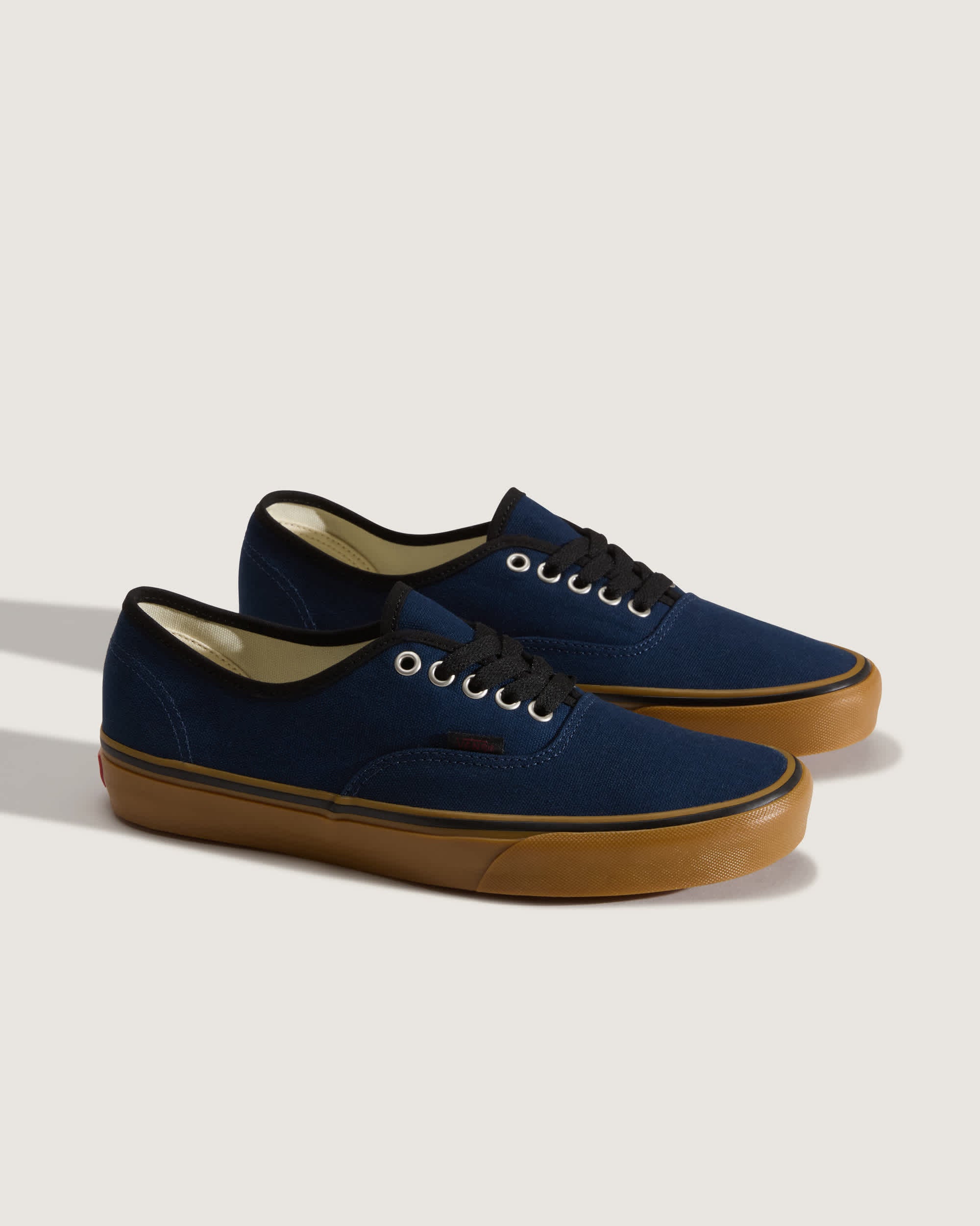 Vans Authentic in Navy with gum outsole — pair three-quarter