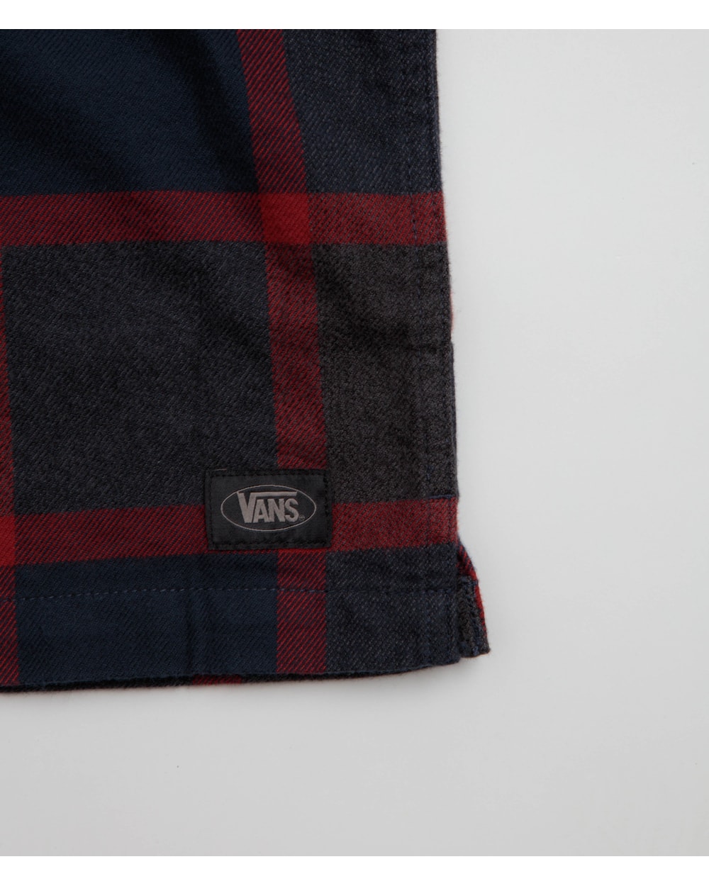 Vans Men's Larkspur Plaid Flannel Shirt Parisian Night/Poppy Ember hem label detail